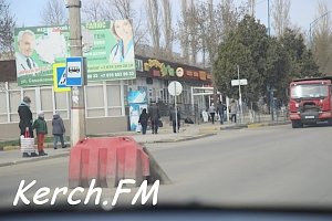 В Керчи люки на Орджоникидзе сровняли с новым асфальтом